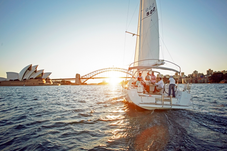A group of people on a yacht sailing on Sydney Harbour, with the Sydney Harbour Bridge and Sydney Opera House in the background © Tourism Australia A group of people on a yacht sailing on Sydney Harbour, with the Sydney Harbour Bridge and Sydney Opera House in the background © Tourism Australia